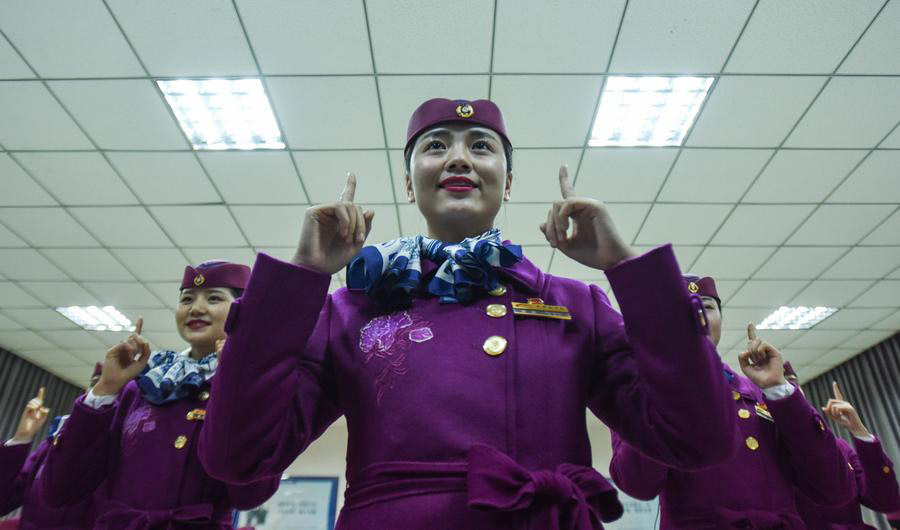 High-speed train stewardesses receive training in SW China