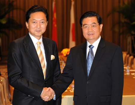 China, Japan vow to promote bilateral ties