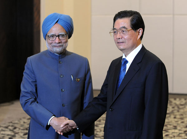 President Hu meets Indian PM on bilateral ties