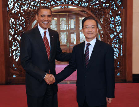 Chinese Premier Wen Jiabao (R) meets with visiting US President Barack ...