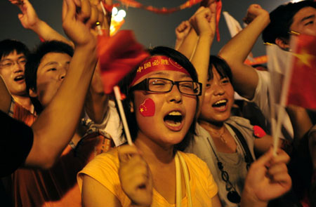 People celebrate the start of the Games