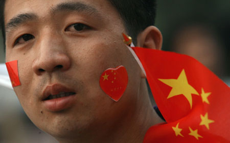 People celebrate the start of the Games