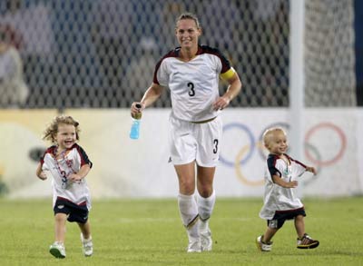Playing with mum on pitch