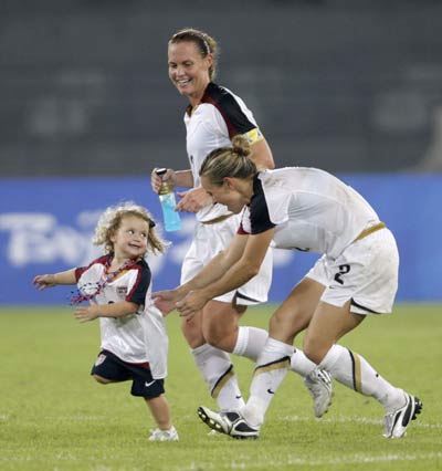 Playing with mum on pitch