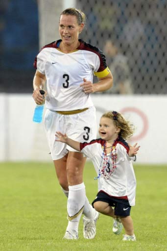 Playing with mum on pitch