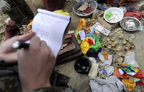 Officials assess damage to historic sites in quake zone