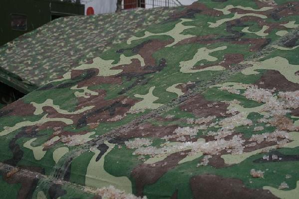 Hail adds to rescue effort challenges