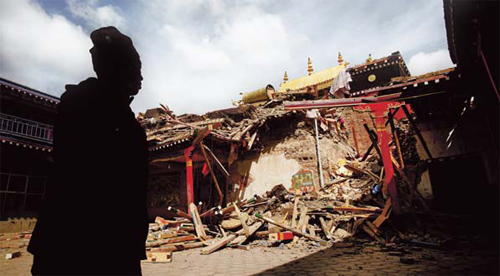 Tibetans begin rebuilding damaged sacred mound