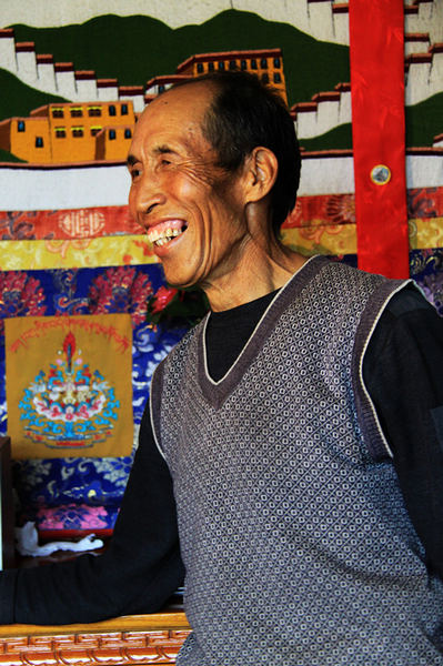 Happy old resident in downtown Lhasa