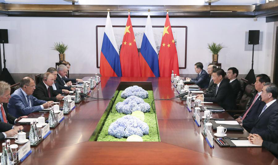 President Xi meets his Russian counterpart Putin