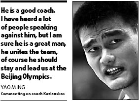 Yao defends coach against media assault