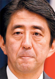 Abe calls it quits amid political row