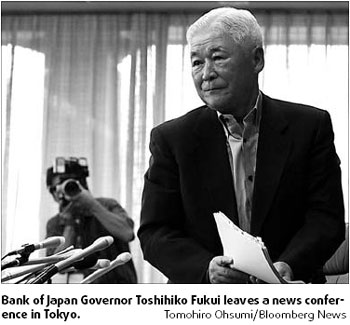 Japan central bank keeps rates on hold