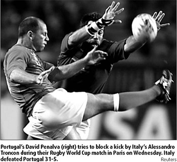 Italy tops Portugal, on course for quarterfinals