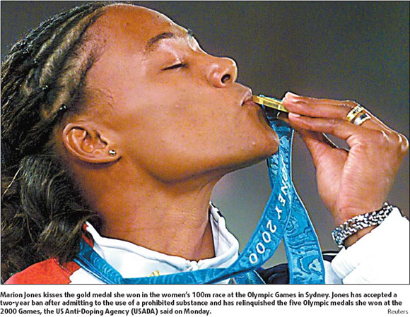 Disgraced US sprinter Jones hands over Olympic medals