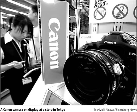 Canon has first slide in 2 years