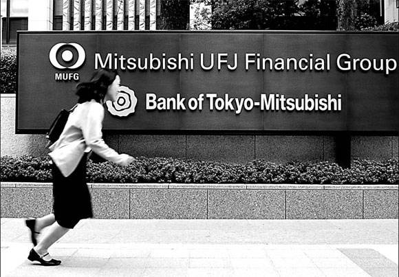 Bank of Japan cuts inflation, growth outlook
