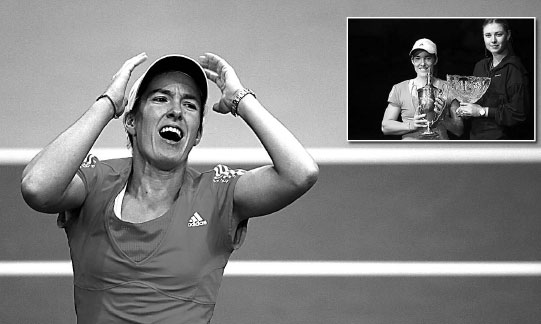 Henin beats Sharapova to retain title