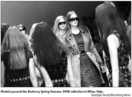 Burberry boosted by trench coats