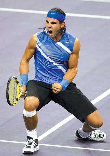 Nadal beats Djokovic to advance