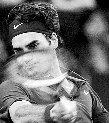 Forget about catching me, warns Federer