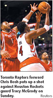 Bosh returns to power Raptors past Rockets
