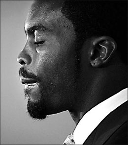 Ex-football star Vick sentenced to 23 months
