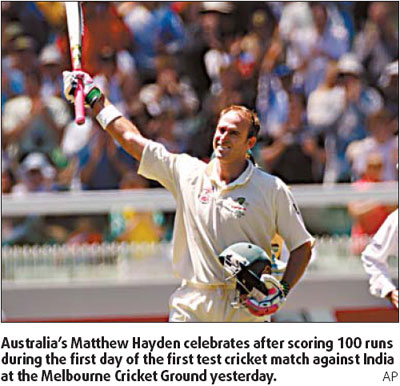 Hayden scores century, India fights back