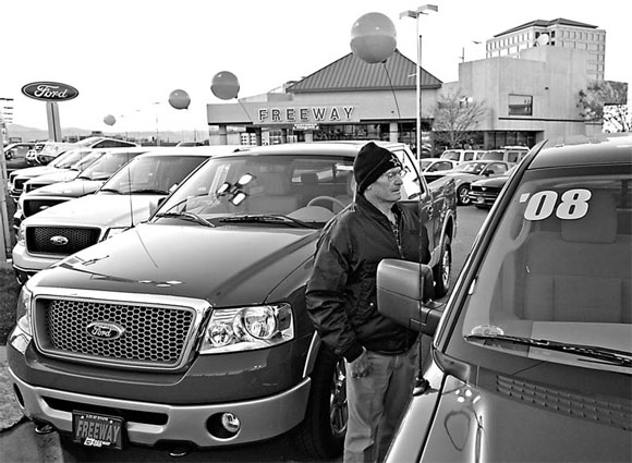 Ford may say Q4 loss narrowed