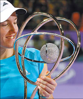 Henin takes aim at Wimbledon
