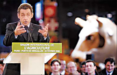 Sarkozy regrets curse but no apology
