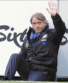 Mancini joyous at lucky Roma draw