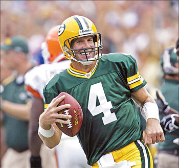 Quarterback great Favre quits at 38