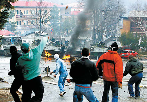 Serbs clash with NATO, UN troops