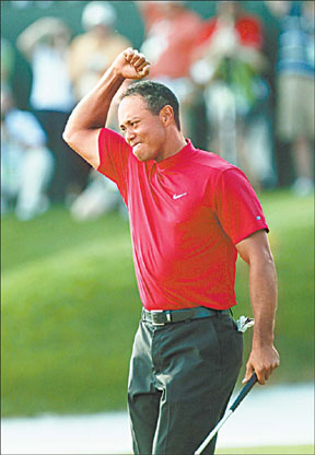 Woods relishes drama of yet another win