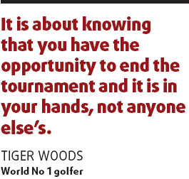 Woods relishes drama of yet another win