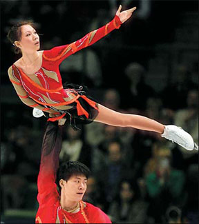 China's Zhangs lose to German pair, Kostner leads women