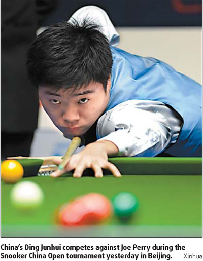 Local star Ding advances as Dott's title defense gets pinched