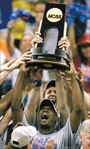 Jayhawks hoist trophy after NCAA thriller