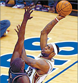 James nets 33 points despite aching back