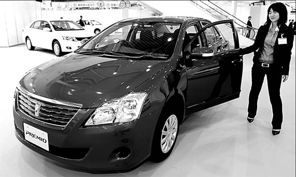 Toyota profit may slide 20 percent