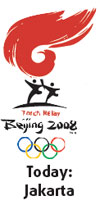 Olympic flame burns bright in the rain