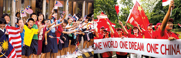 Holy flame lights up S. East Asian faces