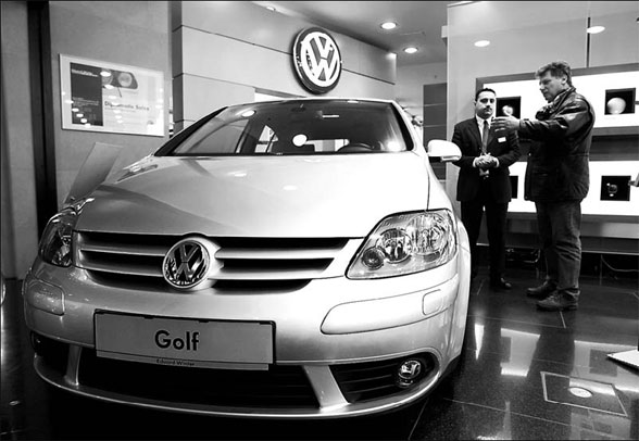VW says profit up 26% on job cuts