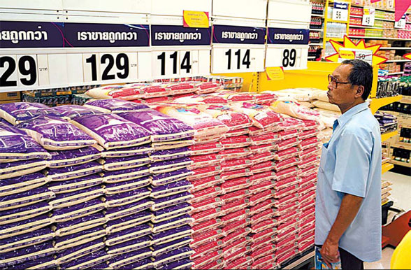 Rice hits record as Wal-Mart curbs sales