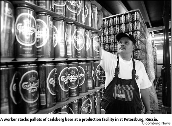 Carlsberg suffers loss on costs