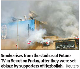 Hezbollah gunmen seize control of western Beirut