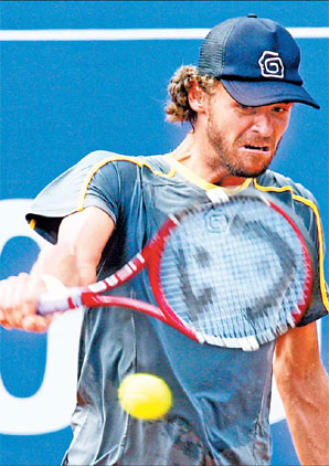 Kuerten returns to Paris for swan song