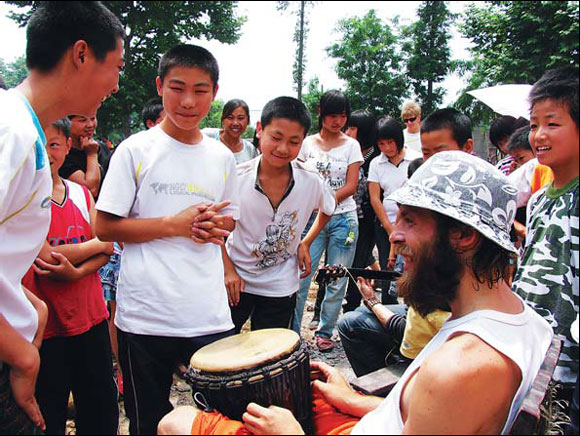 Foreigners give children fun day