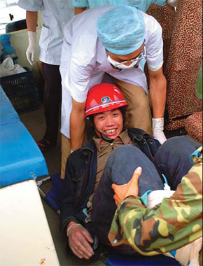 HK rescuers fly victims out of danger